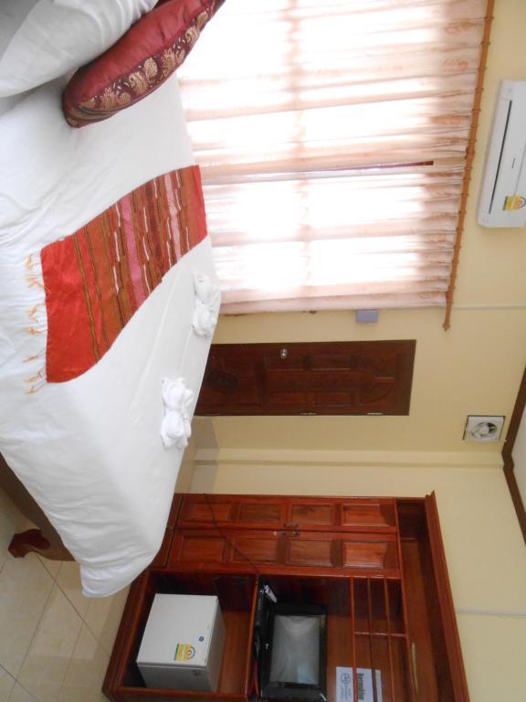 Khampaseuth Hotel Vang Vieng Quarto foto