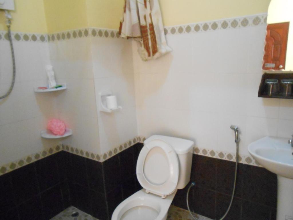 Khampaseuth Hotel Vang Vieng Quarto foto